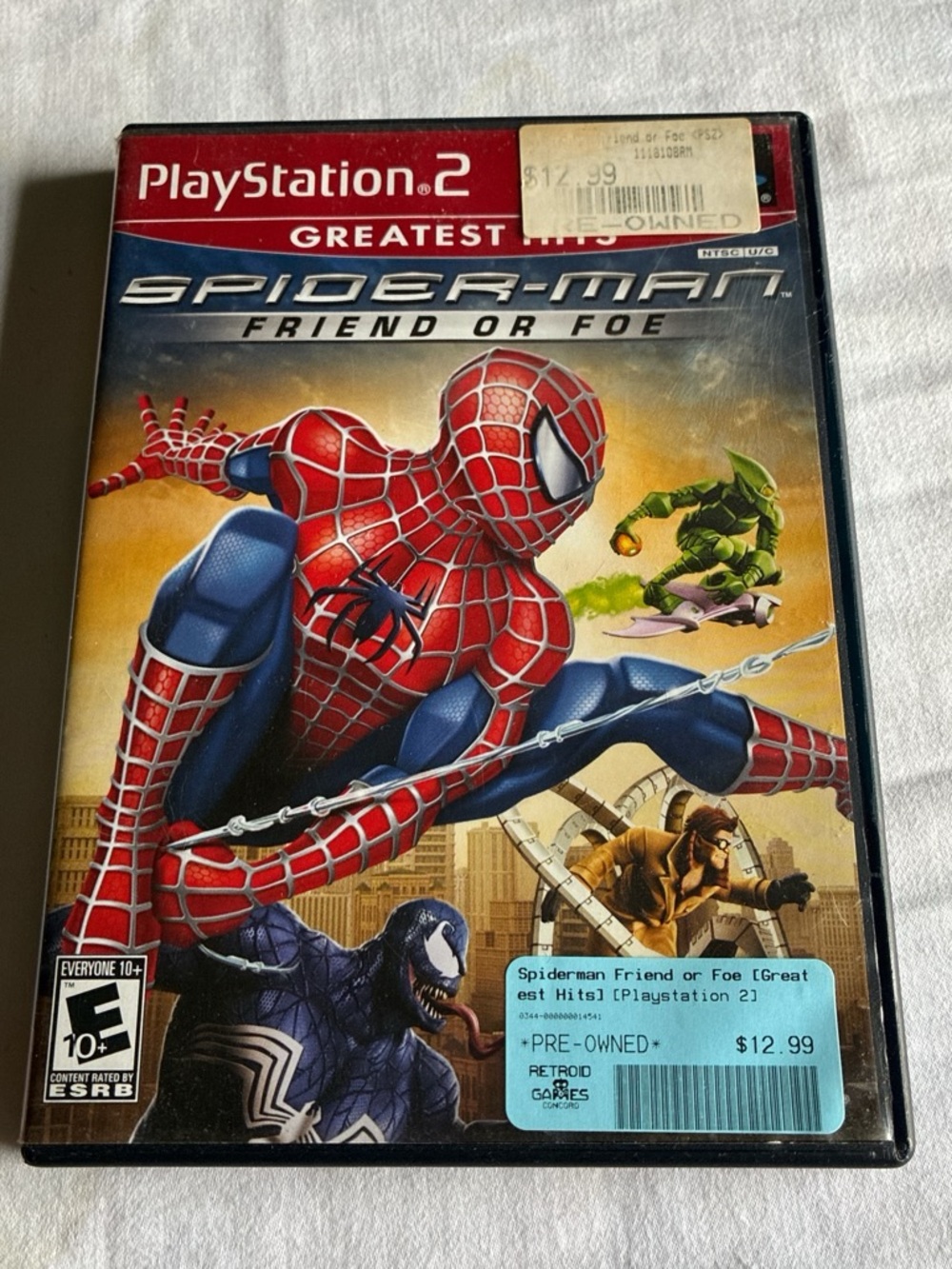 Sony PlayStation 2 Spider-Man: Friend or Foe (Red/BlueHas)A Crack In Disc Works